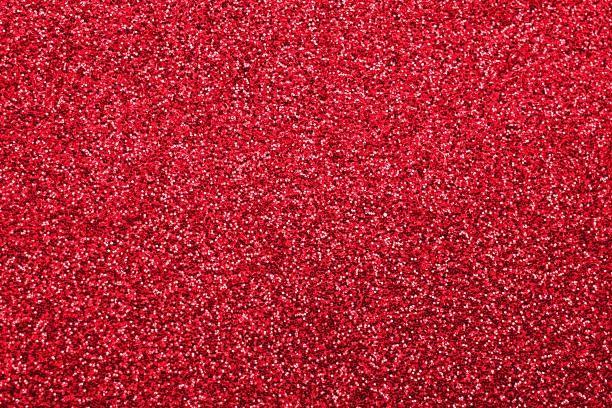 istock Abstract red Christmas glitter sparkle texture background 2246085099
