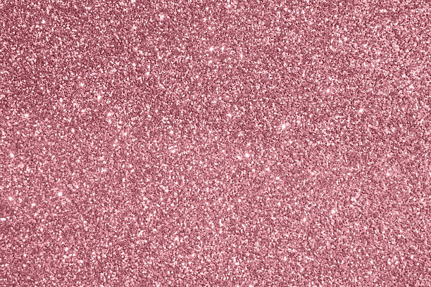 istock Abstract rose gold pink glitter sparkle texture background 2246085117