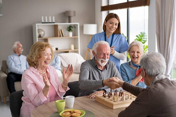 istock Seniors cheering and applauding during chess game 2246086942