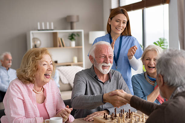 istock A joyful handshake among seniors during a chess game 2246086947