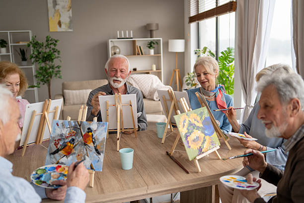 istock Art Class with Seniors Creating Beautiful Paintings Together 2246086951