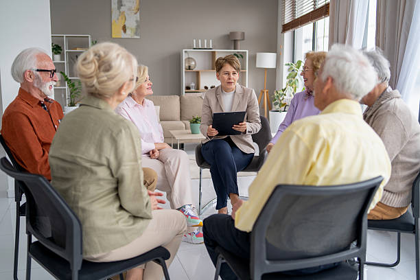 istock Facilitator leads an engaging session with seniors group 2246086981