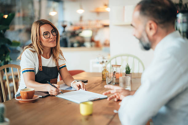 istock Small business owner discussing financing options with loan agent 2246087073
