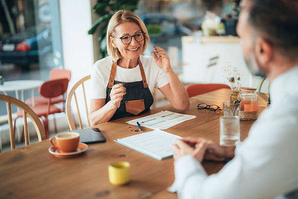 istock Small business owner discussing financing options with loan agent 2246087074