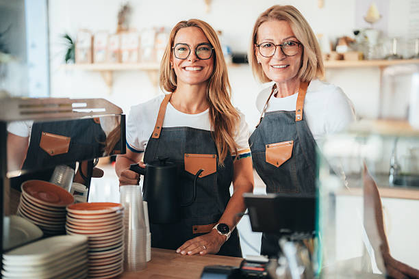 istock Confident coffee shop and bakery owners standing together 2246087083