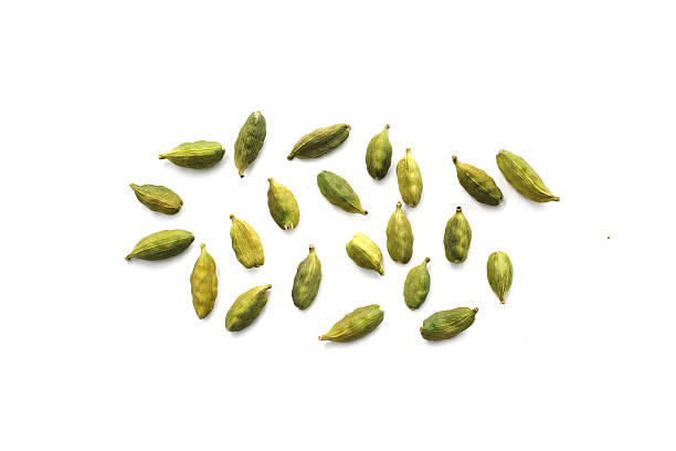 istock Green cardamom pods with aromatic and medicinal benefits. 2246087471