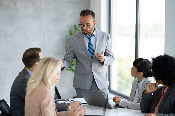 istock Engaged discussion with focus on strategic planning 2246091154