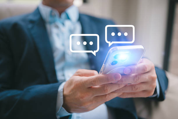 istock Social Media businessman hand using smartphone typing live chat chatting on application communication digital web and social network concept. Social media application chat box 2246097087