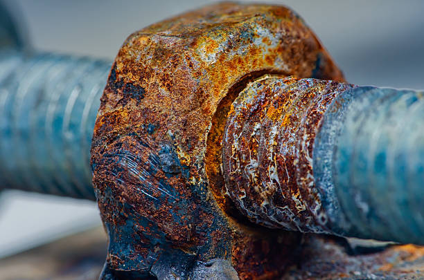 istock Rusted metal bolt and nut showing corrosion texture 2246101398