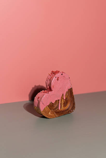 istock Valentine's Day Birthday holiday present gift idea Coffee cappuccino latte beverage drink Morning breakfast Holiday birthday anniversary shiny candle sparkler on cake Delightful and vibrant heartshaped pastry croissant treat, beautifully topped with 2246101853