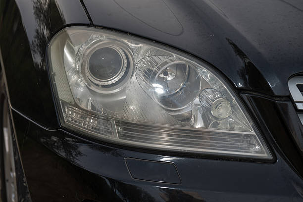 istock shiny headlights on a new car 2246103135