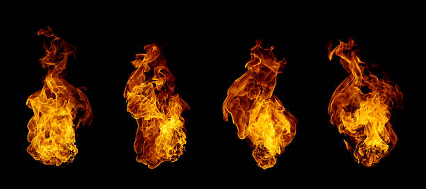 istock Realistic fire flames isolated on black background, capturing bright orange and yellow heat energy movement. Perfect for design, advertising, motion effects, or digital art backgrounds. 2246107574