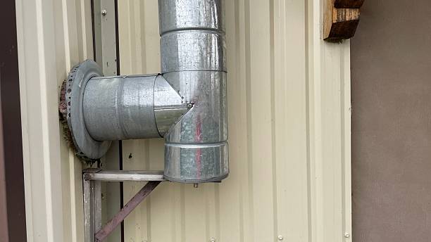 istock Chimney mounting system on wooden frame house 2246109078