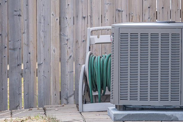 istock Air conditioning unit on outside of house 2246111746