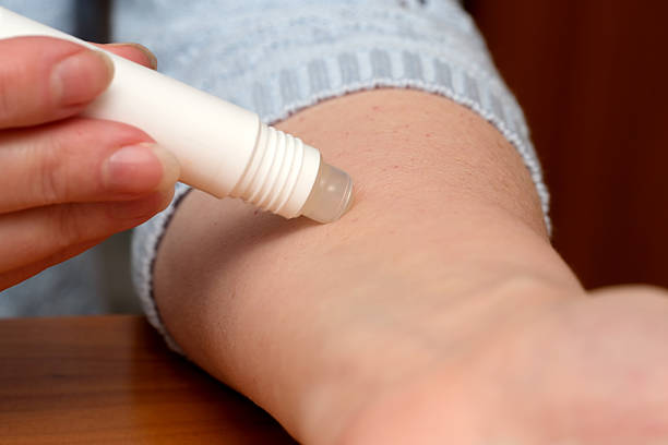 istock Rolling a soothing balm on an arm for comfort and relief 2246112713