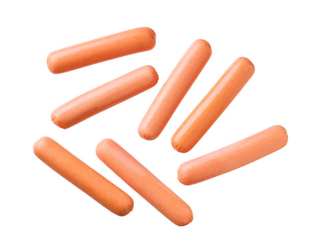 istock whole boiled sausages isolated on white background, top view. 2246114717
