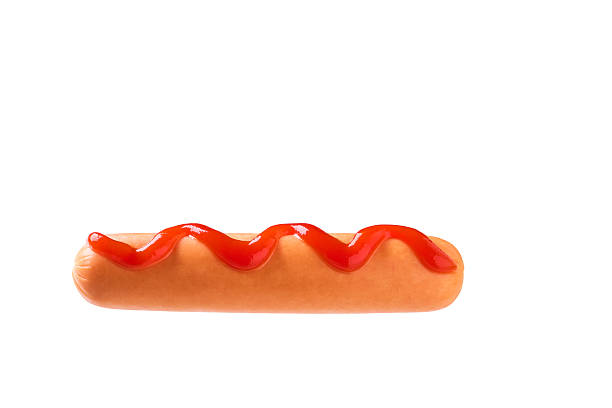 istock boiled sausage with ketchup isolated on a white background. 2246115011