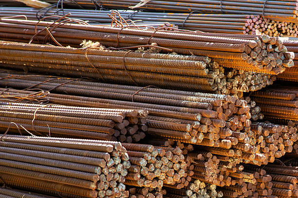 istock Rusty steel rebar stacked at construction site, close-up view 2246116163