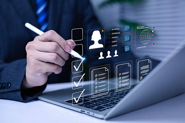 istock Businessman using digital interface on laptop for online data management, checklist, and virtual profile analytics. Concept of business technology, workflow automation, and digital transformation. 2246116479