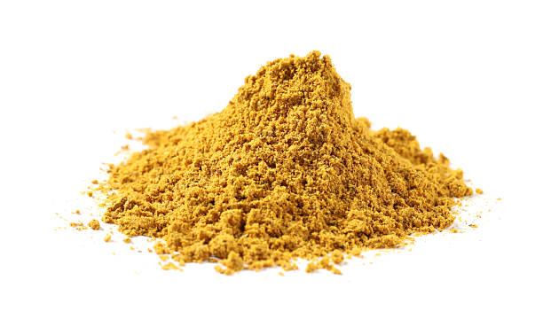 istock Pile of dry curry powder isolated on white 2246116785