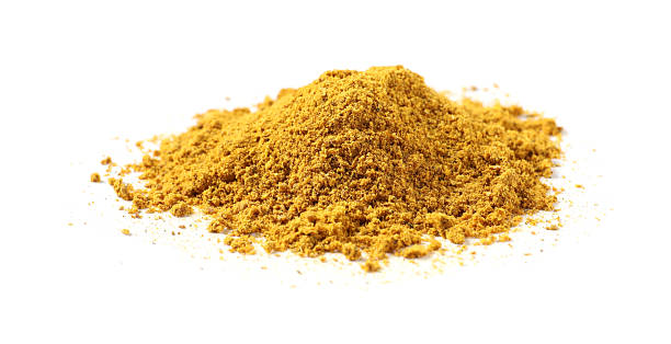 istock Pile of dry curry powder isolated on white 2246116804