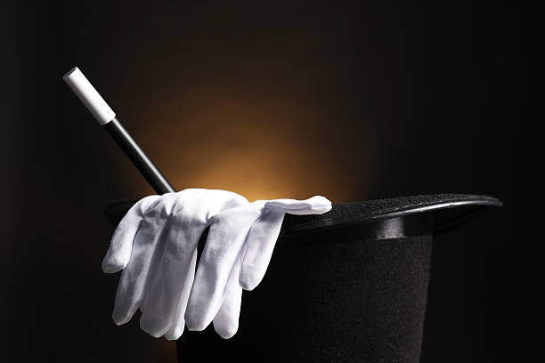 Magician Hat And Coins On White