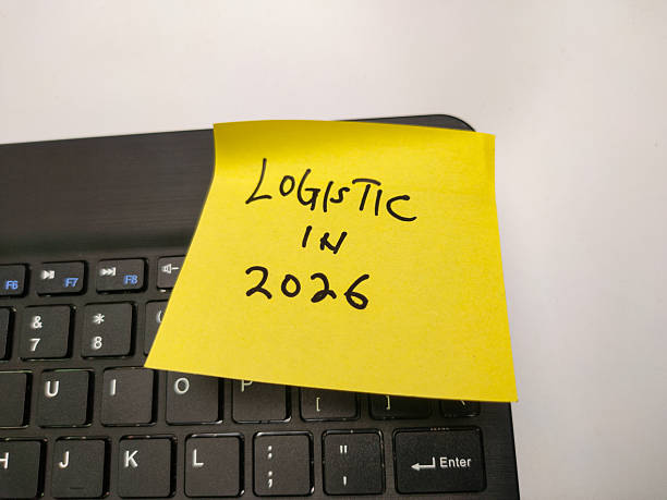 istock The image shows a yellow sticky note on a black computer keyboard. The note has the handwritten text LOGISTIC IN 2026 2246123110