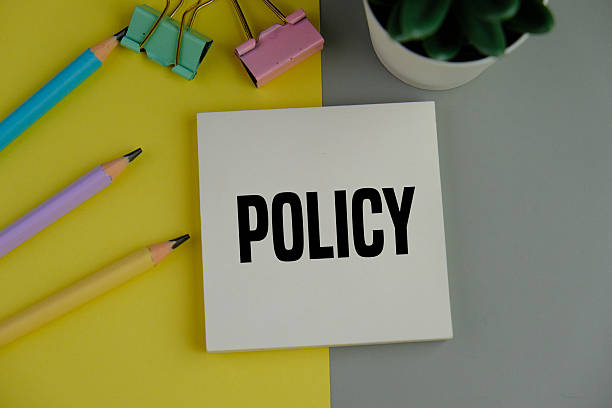 istock white notebook with the word policy. basic concepts or organizational policies 2246127270