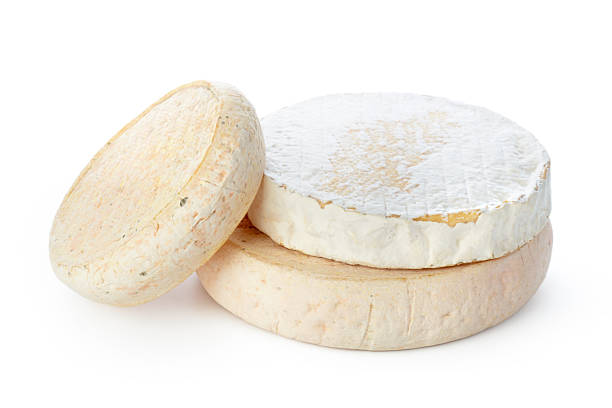 istock Three types of soft cheese stacked on each other on a white background 2246130264