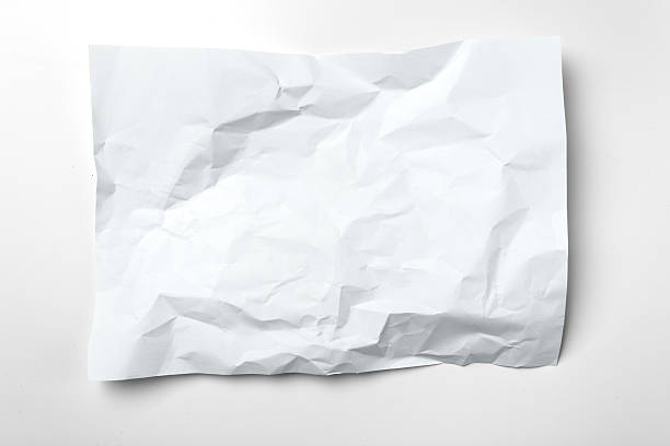 istock Crumpled white paper rests on a flat surface highlighting texture and folds 2246132753