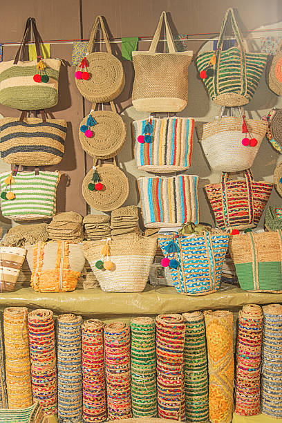 Woven old burlap sack mop cloth with distributed focus making a rustic uneven grid wrinkled sack textured background.
