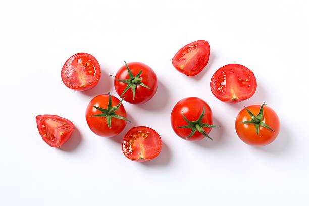 istock Flat lay composition with fresh cherry tomatoes on white background. Ripe vegetables 2246134610