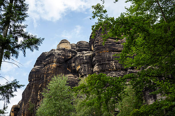 Beautiful nature with hiking trails through forests and rock formations in Saxon Switzerland.