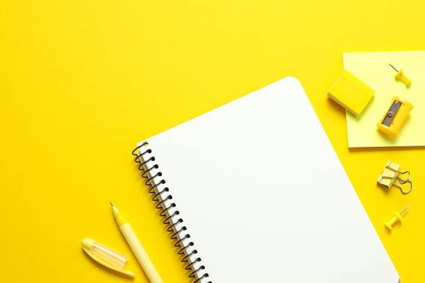 istock Bright yellow school stationery on color background, top view, space for text 2246134827