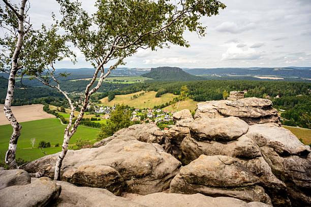 View from the Pfaffenstein and beautiful nature with forests and rock formations in Saxon Switzerland.