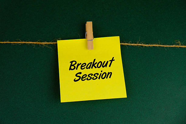 istock Top view Breakout Session wording with yellow notepad. Business education concept 2246136360