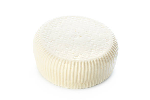 istock Soft cheese round on a white background ready for serving and pairing 2246137073