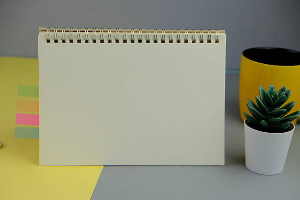 istock blank paper next to school tools with no word as a template for text space concept. business and education concept 2246137548