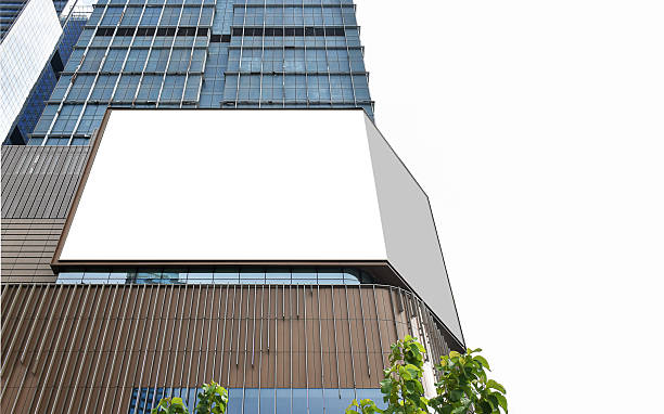 istock Mock up white corner LED display billboard on shopping mall building. Clipping path for mockup 2246137594