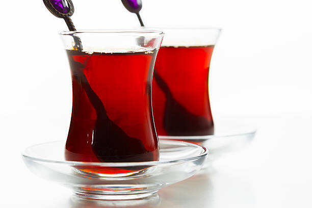 istock Enjoying traditional tea in elegant cups with decorative spoons on a bright surface 2246142065
