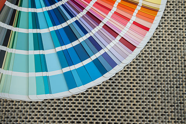 istock Color swatch fan deck on textured woven mat, ideal for interior or graphic design ideas 2246143574