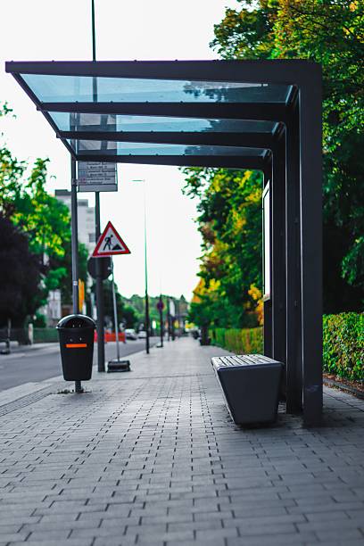 istock Modern bus stop on a quiet urban street. 2246144777