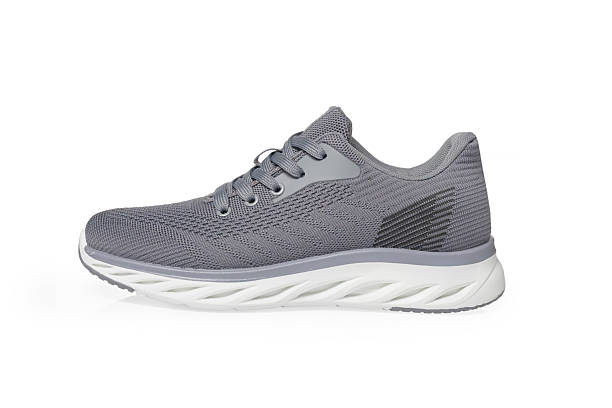 istock Gray Knit Athletic Sneakers Isolated on White Background - isolated 2246146348