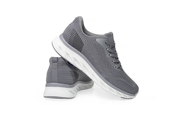 istock Gray Knit Athletic Sneakers Isolated on White Background - isolated 2246146352