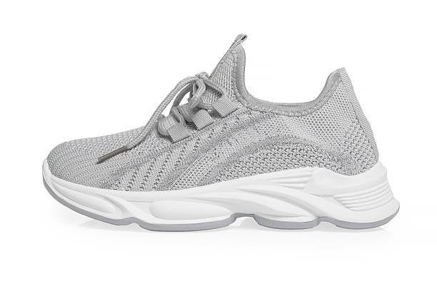 istock Gray Knit Athletic Sneakers Isolated on White Background - isolated 2246146354