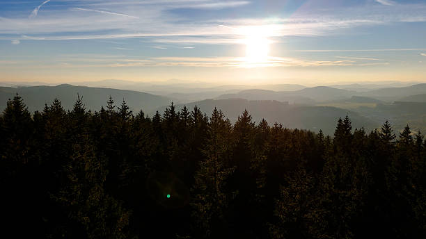 istock Drone flight over sunrise, mountains, forest, USA, America 2246147098