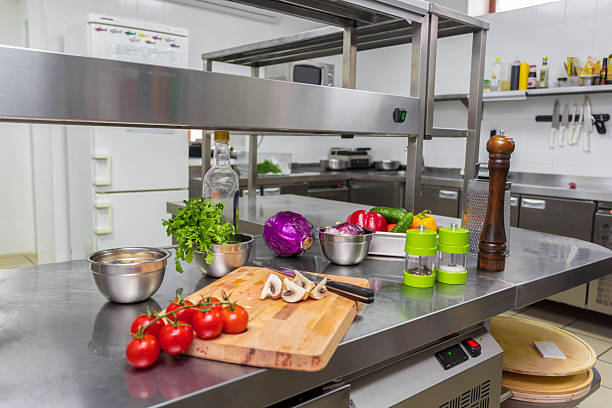 istock Cutting vegetables and preparing meals in a modern restaurant kitchen setting 2246150065