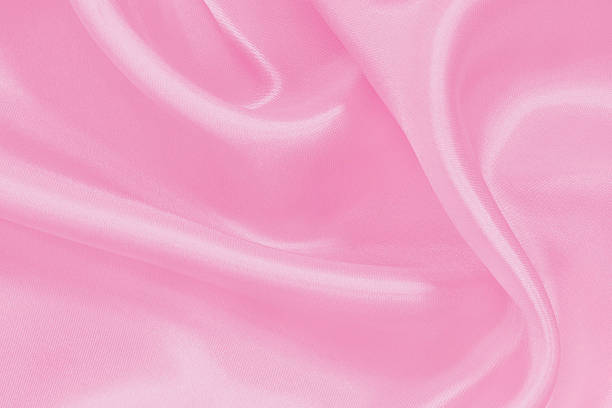 istock Pink fabric cloth texture for background and design art work, beautiful crumpled pattern of silk or linen. 2246150635