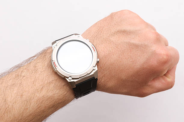 istock Modern smart watch bracelet with white screen on a man's wrist. Mockup for design 2246153020