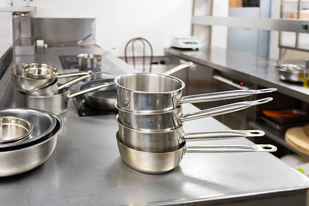 istock Stainless steel measuring cups stacked on a kitchen counter in a modern cooking space 2246153092